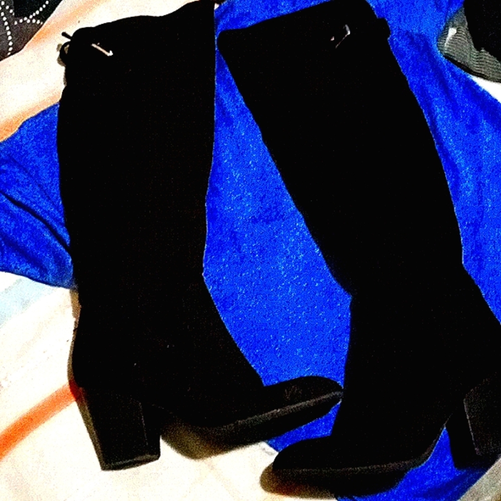 One pair of black knee high boots.Brand name diba size 7 1/2